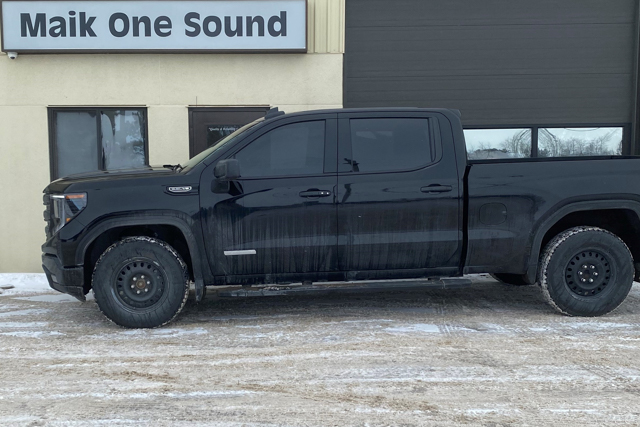 2025 GMC Sierra with professional window tint in North Bay